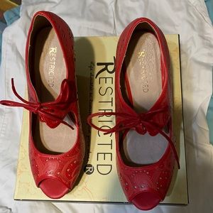 Red brand new wedges by Restricted
